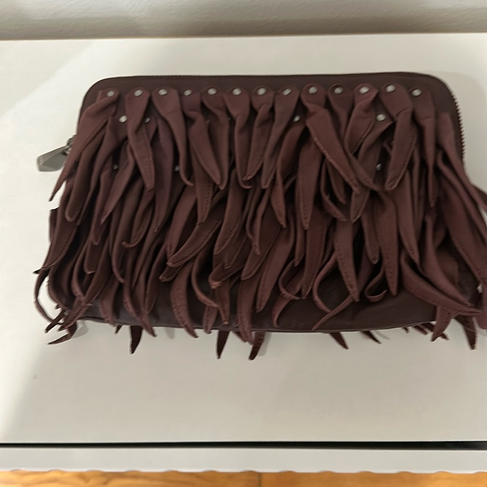 Pour and Victoire plum clutch
